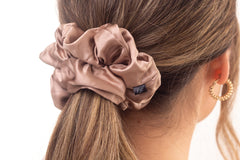 Mulberry silk hair scrunchie in woman's hair. The r and r collective.
